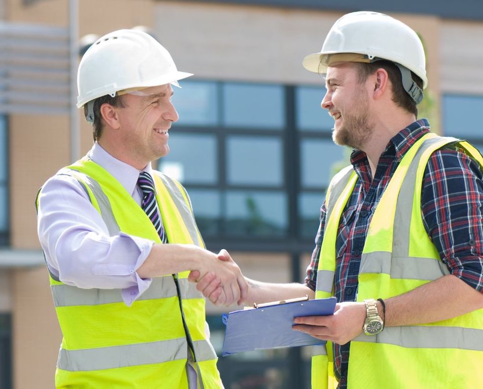 Electrical Contractors Shaking Hands on a job site